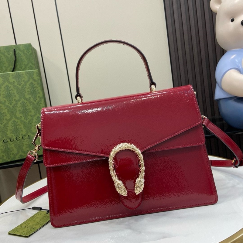 G*u*i top handle bags